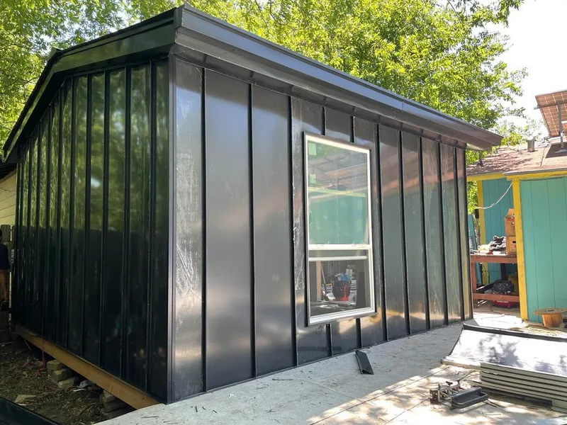 Black standing seam metal wall panels for Roof Inspection in Landen