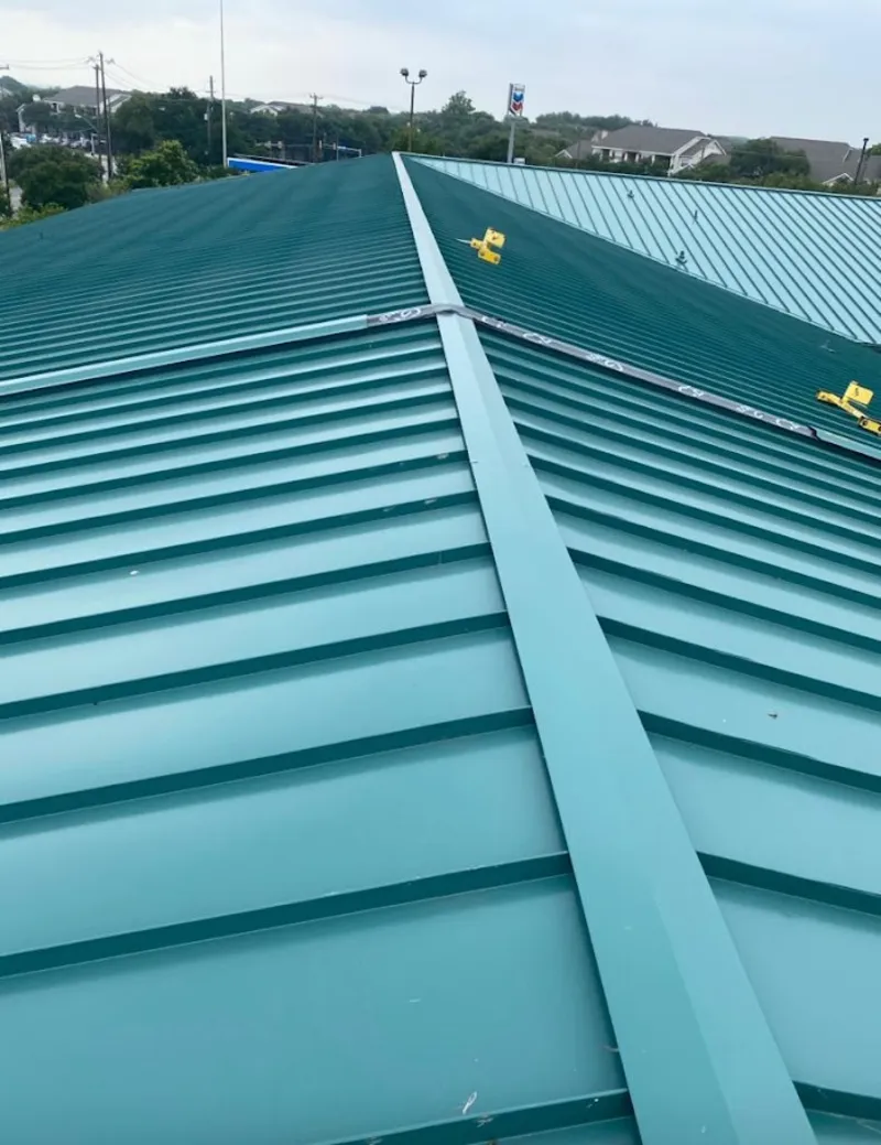 Green commercial metal roof ridge and valley for Metal Roof Repair in Landen